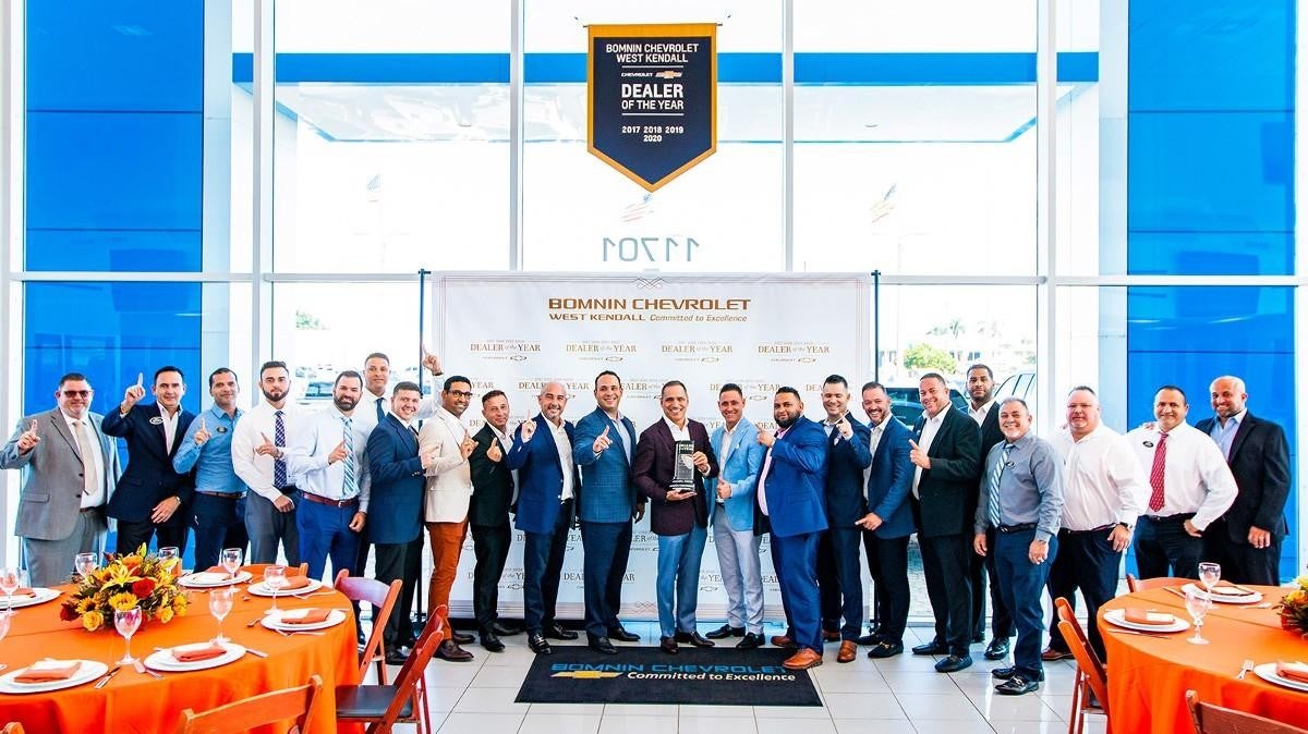 dealership interior group photo Bomnin Chevrolet Buick GMC Nanuet in Nanuet NY