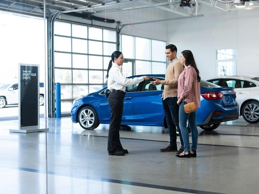 salesperson and customers at Bomnin Chevrolet Nanuet in Nanuet NY