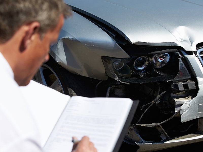 advisor inspecting vehicle Bomnin Chevrolet Buick GMC Nanuet in Nanuet NY
